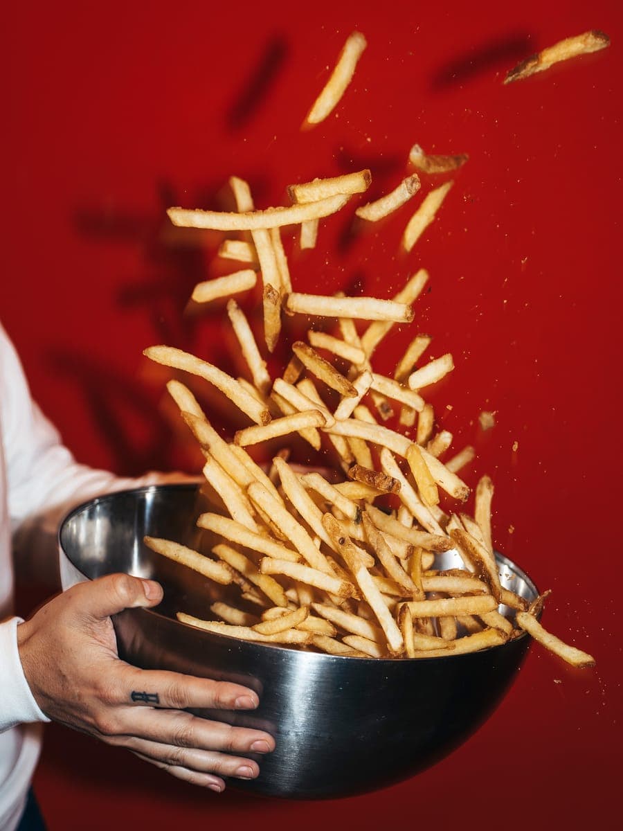 Batatas fritas temperadas na hora